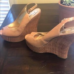 Size 8.5 nude peep toe wedges $30. Only worn once!